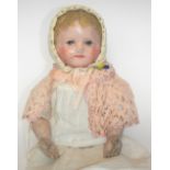 Martha Chase cloth doll, American circa 1905, the stockinette head and body painted with oils,