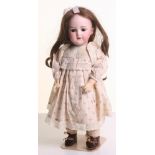 Simon & Halbig 1249 ‘Santa’ bisque head doll, German circa 1910, with weighted brown glass eyes,