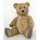 Chiltern Teddy bear, English 1950’s, light brown mohair bear with orange plastic eyes, stitched