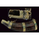 A big powder-flask dating: 19th Centuryprovenance: NepalHorn flask of curved shape, faceted at the