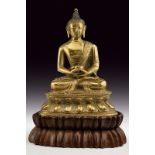 A gilt bronze depiction of Buddha dating: 18th Centuryprovenance: TibetFine, gilt and engraved,