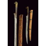 A lot of two flyssa dating: circa 1900provenance: AlgeriaA long sword and a short knife. Both with