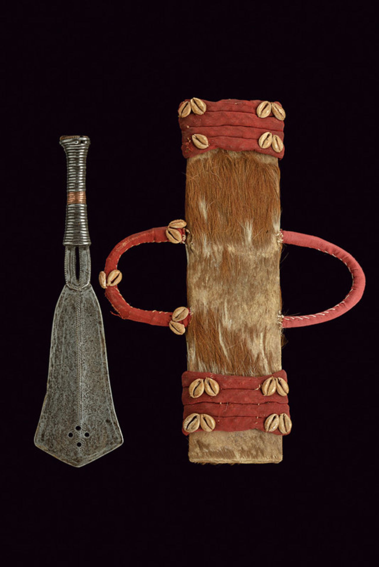 A Yakoma knife dating: circa 1900 provenance: Central Africa Ribbed, double-edged, iron blade,