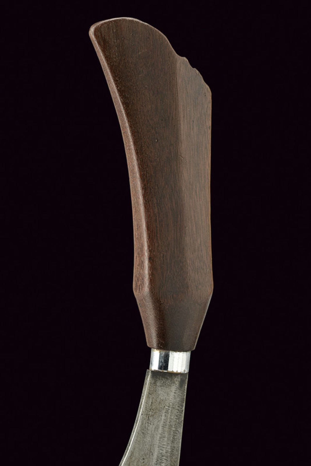 A Bagobo knife dating: circa 1900 provenance: The Philippines Wide, single-edged, iron blade; wooden - Image 2 of 3