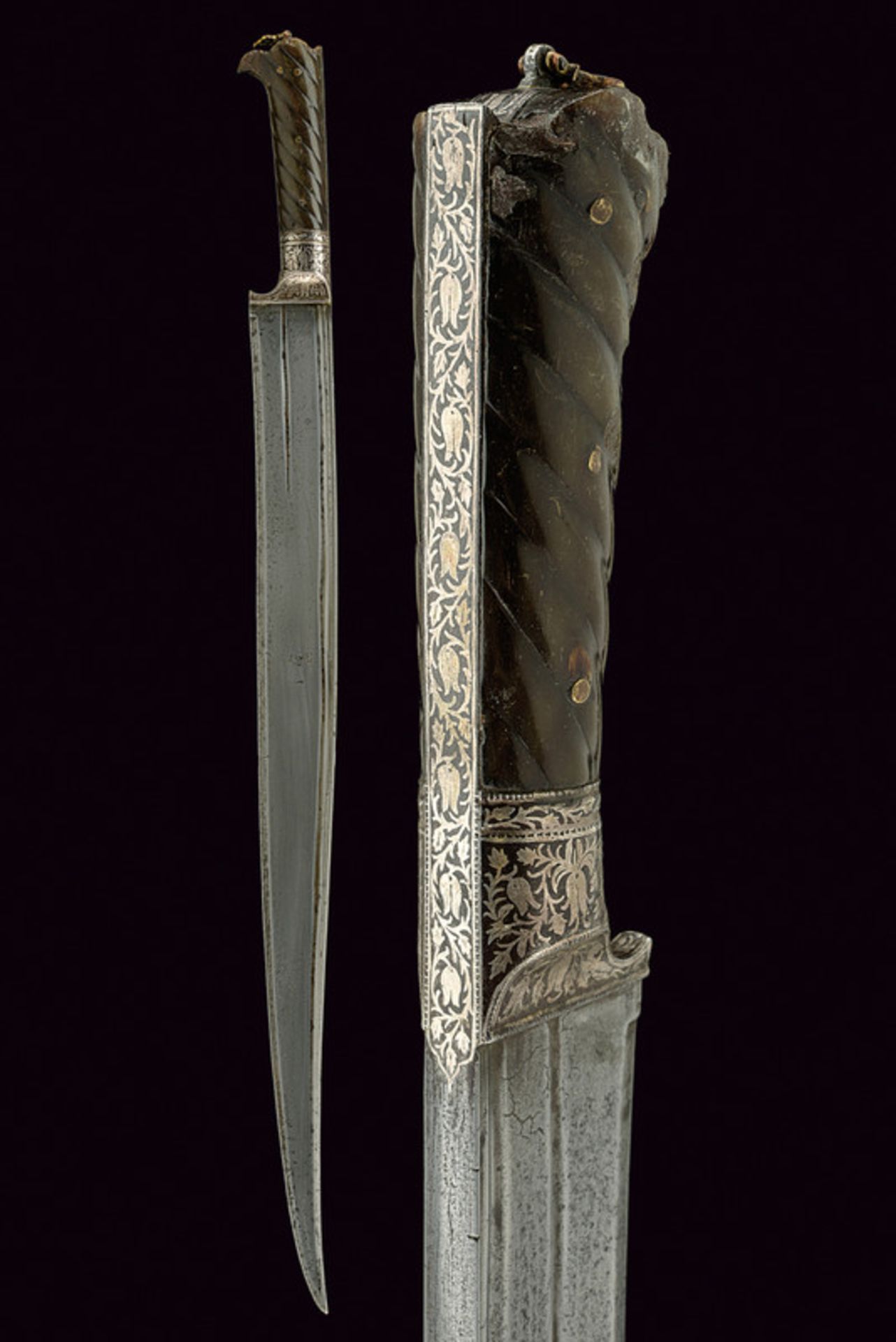 A long Khyber knife dating: mid-19th Century provenance: Afghanistan Slightly curved, single-edged