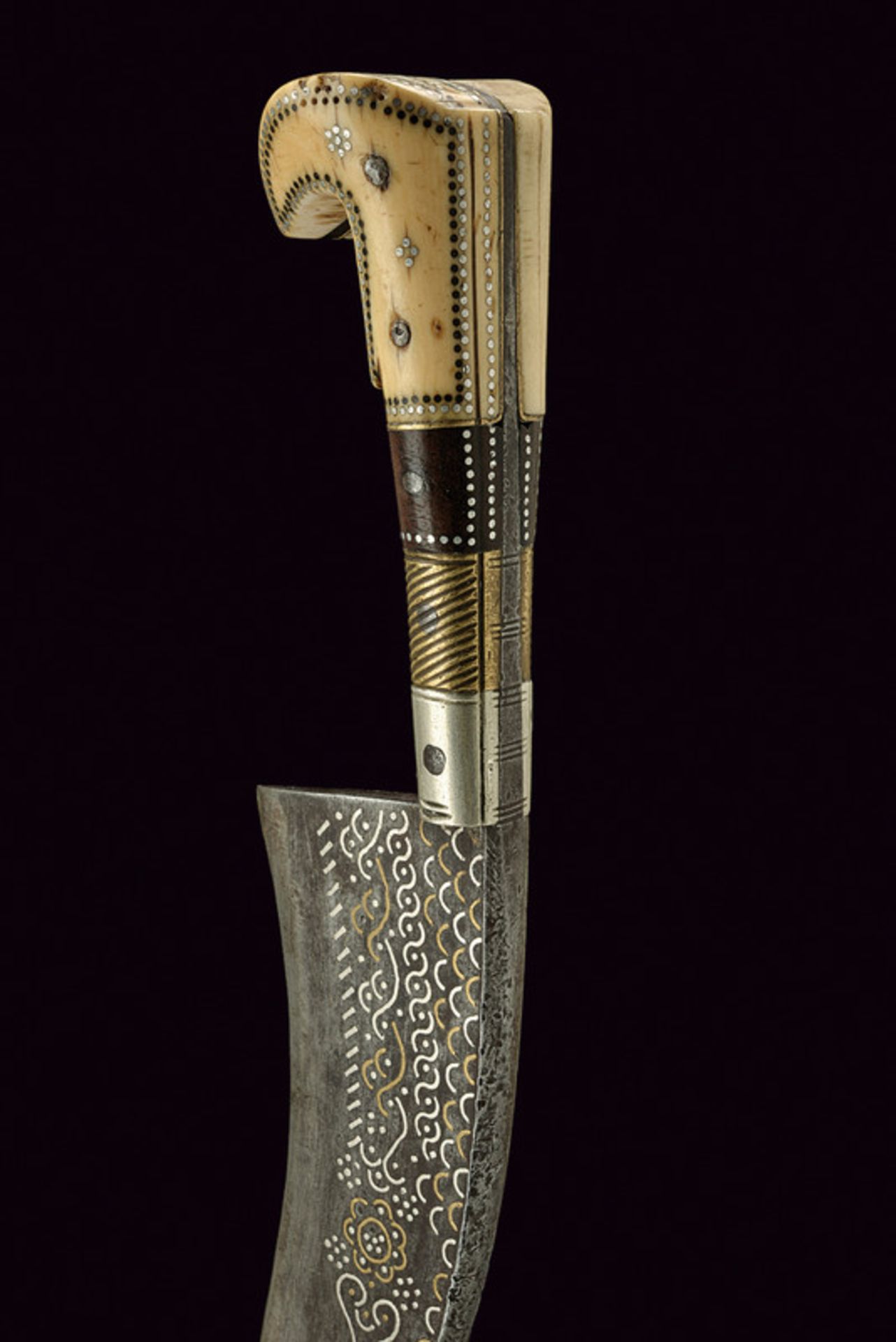 A kerala (knife) dating: 19th Century provenance: India Wide, curved blade with "T"-back, - Image 2 of 3