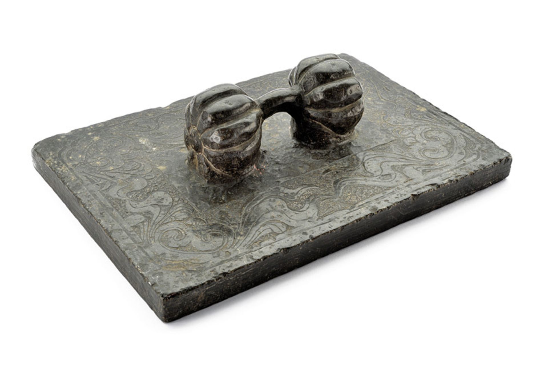 A stone sculpture dating: 19th Century provenance: China Rectangular base engraved with floral