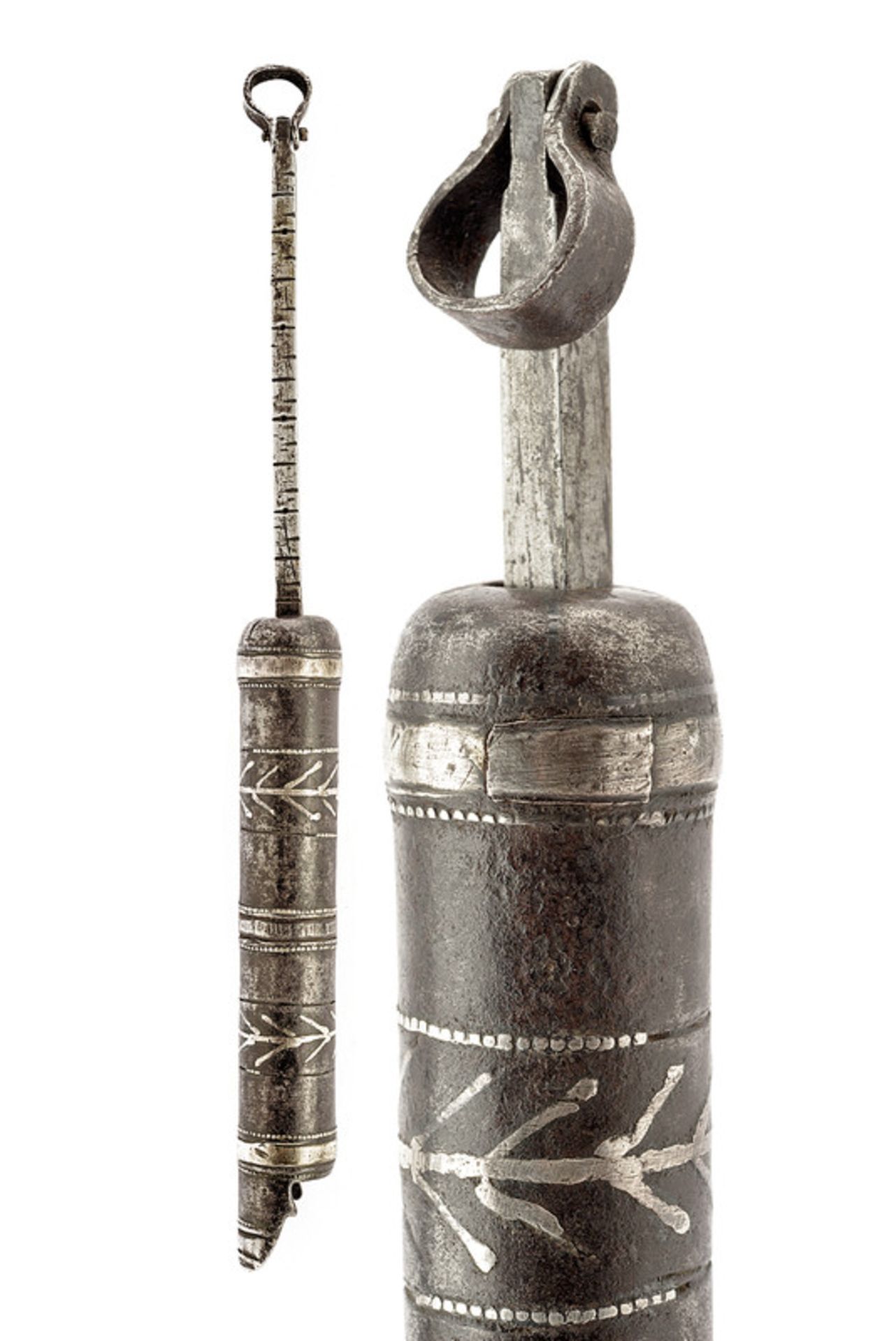 A powder dispenser dating: early 19th Century provenance: Turkey Cylindrical, iron body featuring