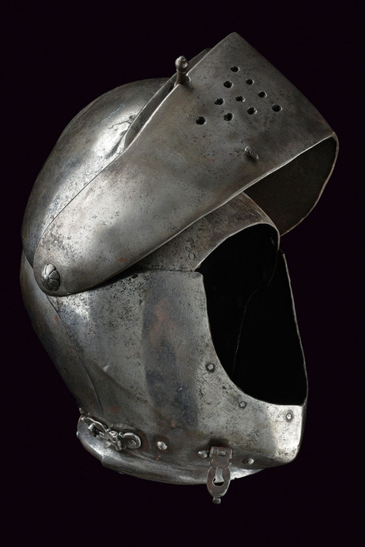 A closed helmet dating: third quarter of the 16th Century provenance: Italy Skull worked in one - Image 4 of 5