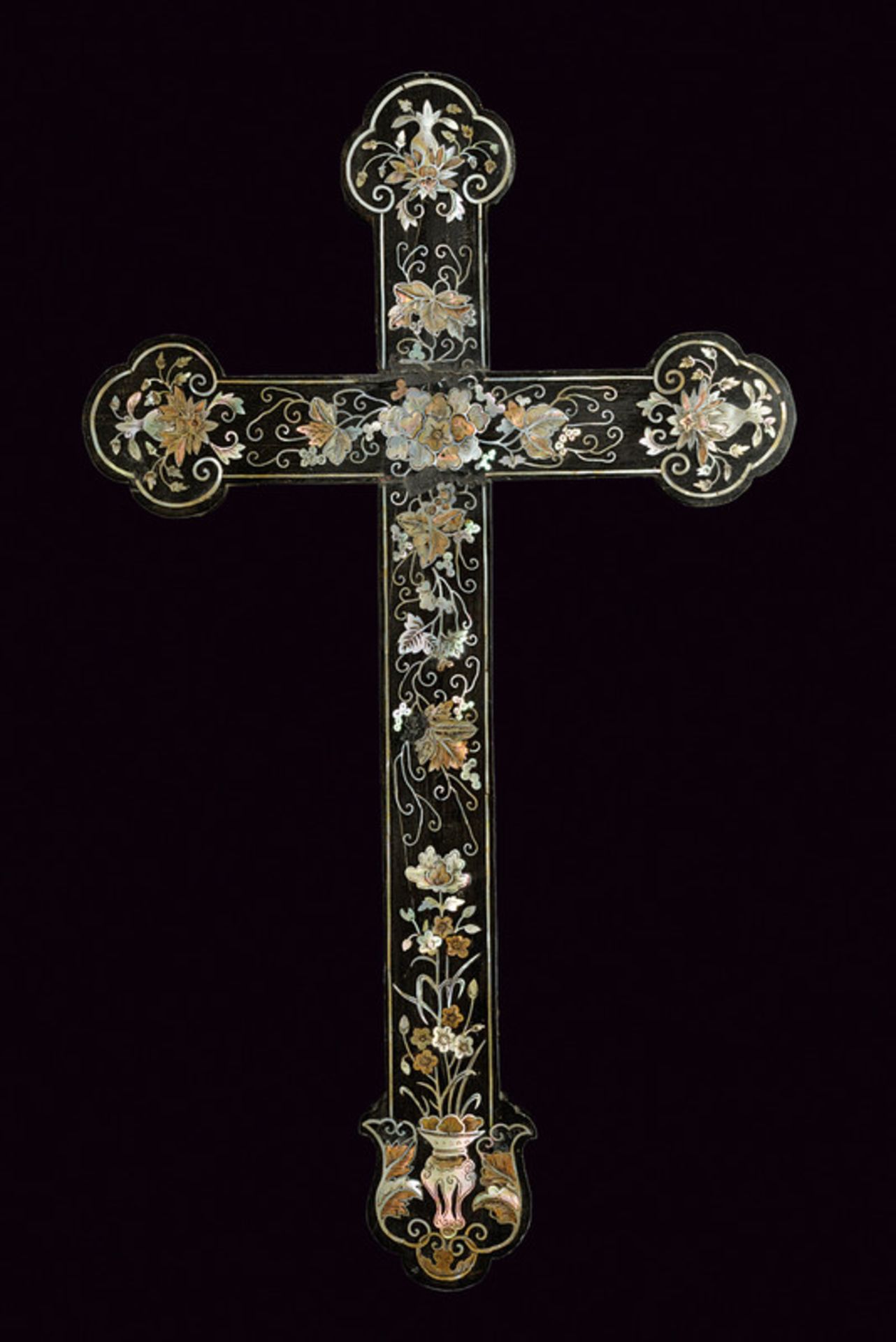 A crucifix dating: circa 1900 provenance: Vietnam Wooden crucifix with colver-shaped edges, the