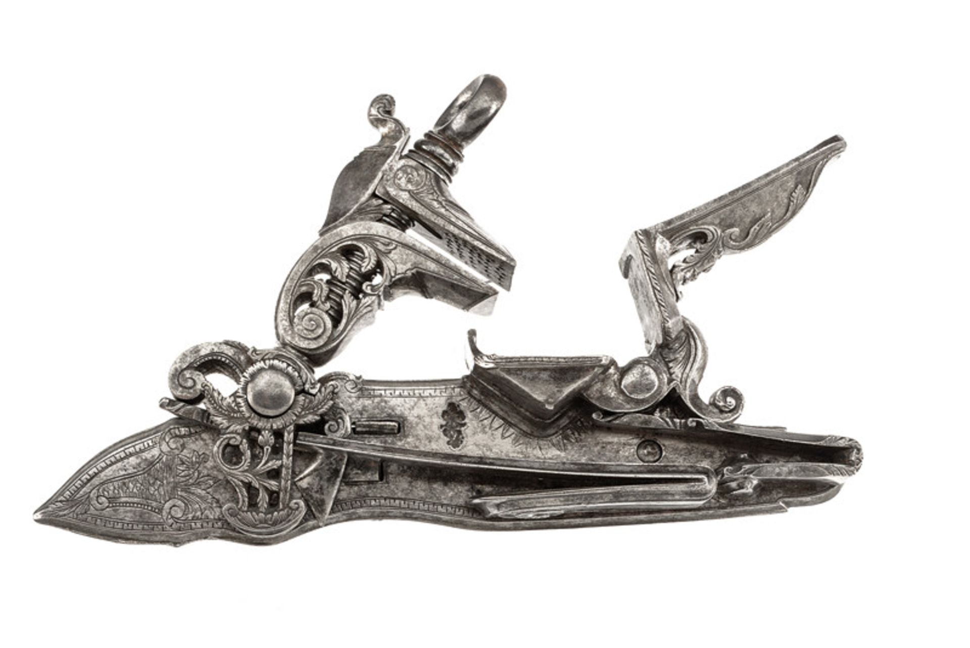 A rare miquelet flintlock dating: third quarter of the 18th Century provenance: Naples Engraved lock