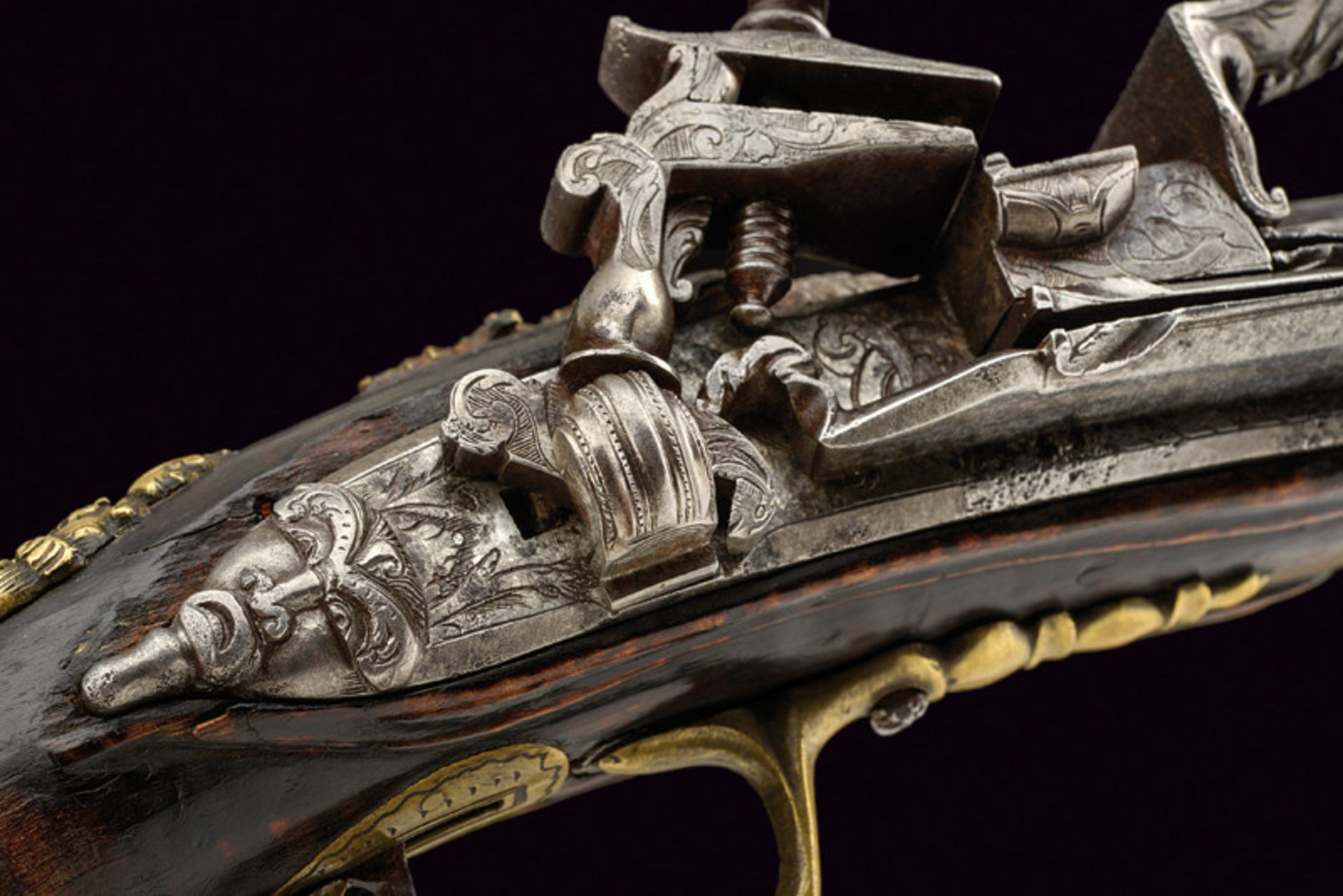 A very interesting and rare flintlock pistol in roman style dating: 17th Century provenance: Central - Image 4 of 13