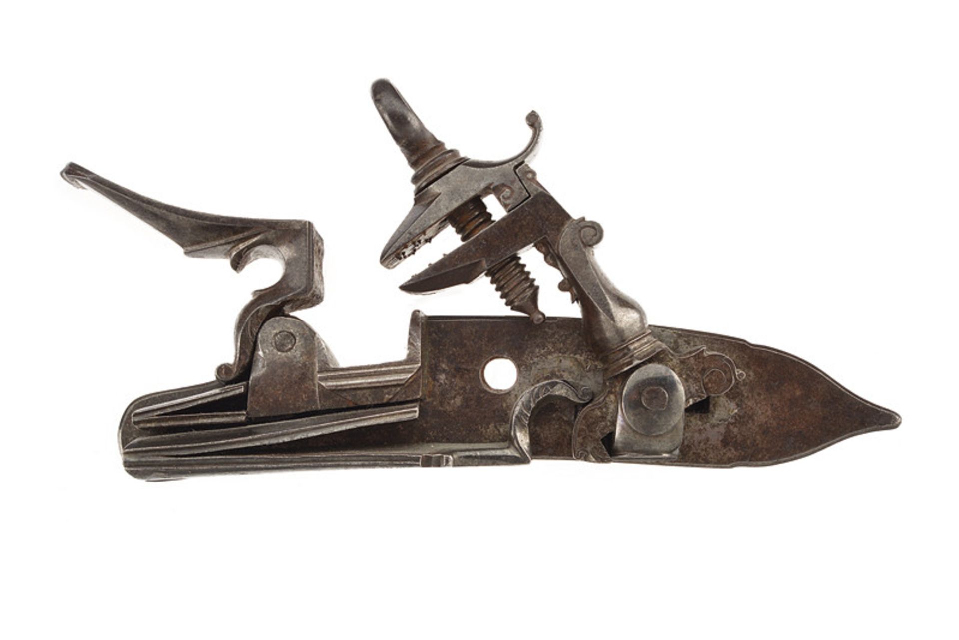 A roman style left lock dating: 18th Century provenance: Central Italy Flintlock; with smooth,