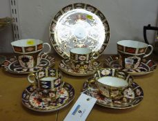 Three Royal Crown Derby cups and saucers