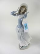 Large Lladro figure of a windswept girl,