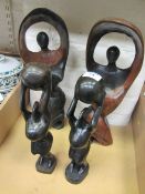 Two pairs of African figures (4)