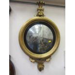 Regency giltwood convex wall mirror