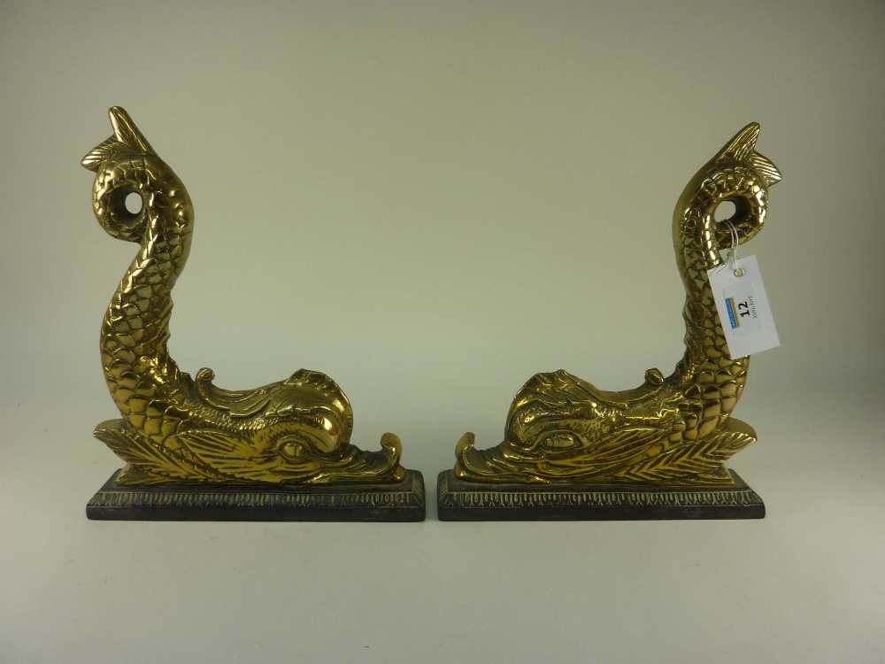 Pair 19th century brass 'Dolphin' doorst