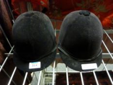 Two vintage riding hats