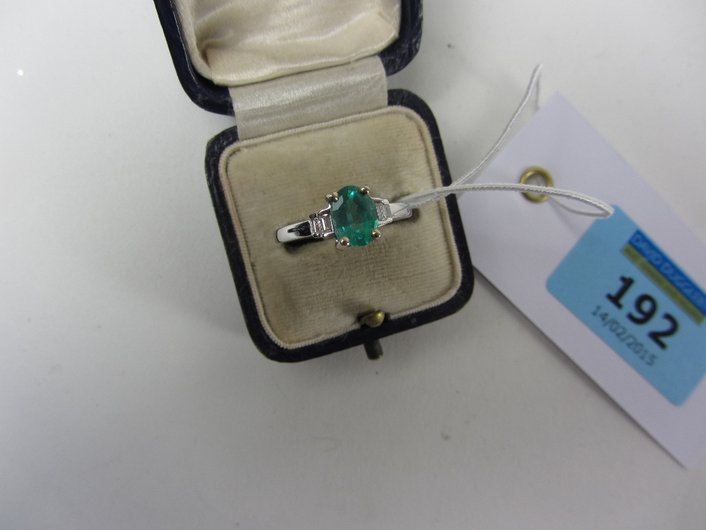 Oval emerald (approx 1 carat) and diamon