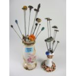 Hat and hair pins in two ceramic holders