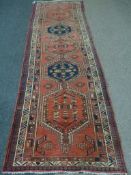 Persian red ground runner, L324cm x W102