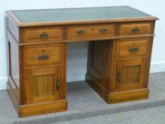 Edwardian walnut twin pedestal desk with