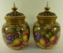 Pair Royal Worcester jars painted with f