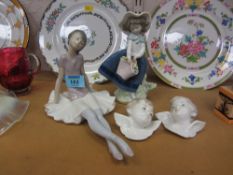 Lladro figure of a seated ballerina and