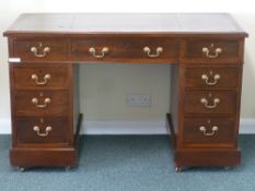 Edwardian walnut twin pedestal desk with