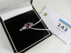 Purple sapphire approx 0.8 carat and dia
