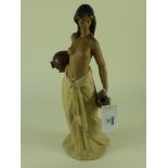 Lladro bisque figurine of a water carrie