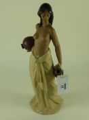 Lladro bisque figurine of a water carrie