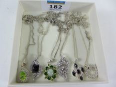 Collection of six pendant necklaces stam
