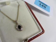 Sapphire and diamond pendant on chain ha