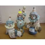 Three Lladro figures of clown children (