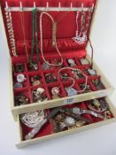 Costume jewellery in two tiered box