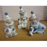 Three Lladro groups of clown children wi