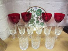 Set of four wine glasses with ruby bowls