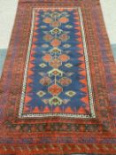 Persian red ground rug, 113cm x 211cm