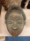 19th century West African carved face ma