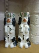 Pair late Staffordshire Spaniel jugs 26c