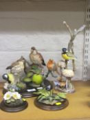 Three Country Artist bird sculpture and