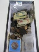 Old world coins and notes in one box