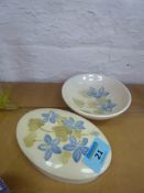 Moorcroft trinket dish and bowl, both decorated with blue flowers on a cream ground