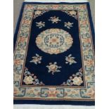 Chinese woollen blue ground rug, 153cm x 91cm