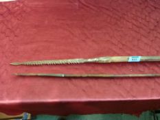 Tribal light weight spear with carved bone head and decorated bamboo type shaft 137cm and another