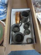 Pewter and copper measures in one box
