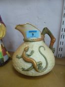 A Royal Worcester 'Lizard' jug, moulded with a bronze and green lizard on a basket weave ground