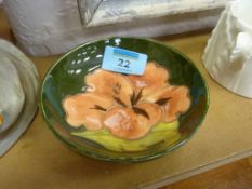 Moorcroft hibiscus on green ground bowl D11.5cm